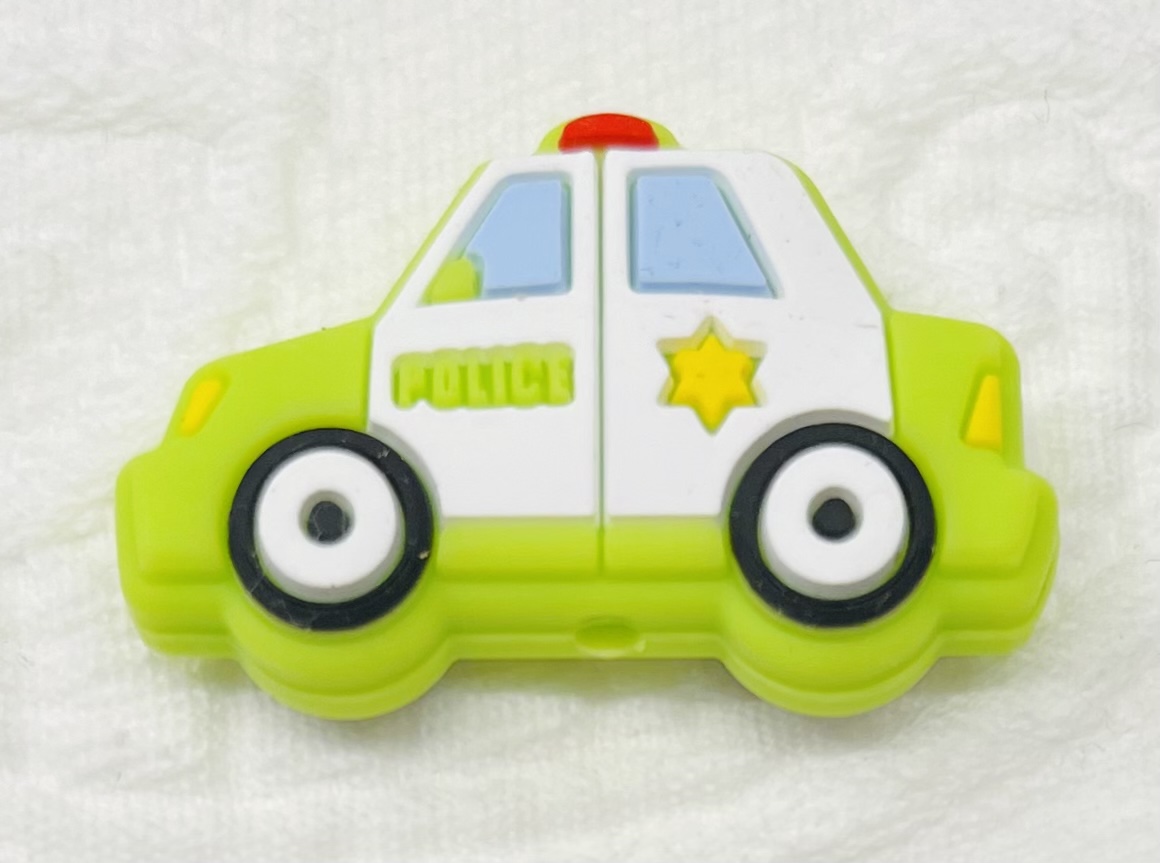 Beissmotiv Polizei Auto lemon