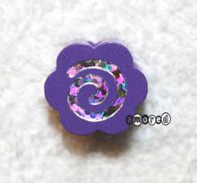 Glitzerblume blaulila