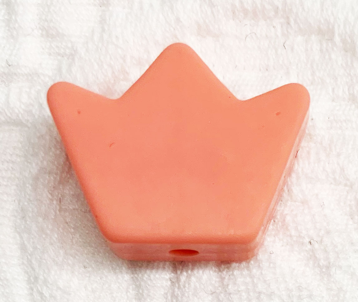Beissmotiv Krone midi coral 