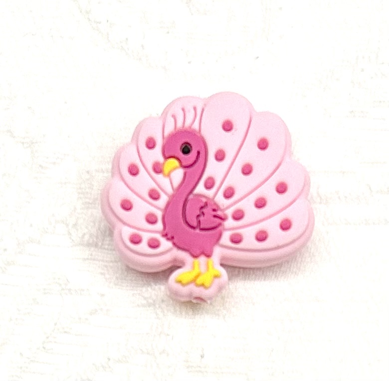 Beissmotiv Pfau pastellrosa