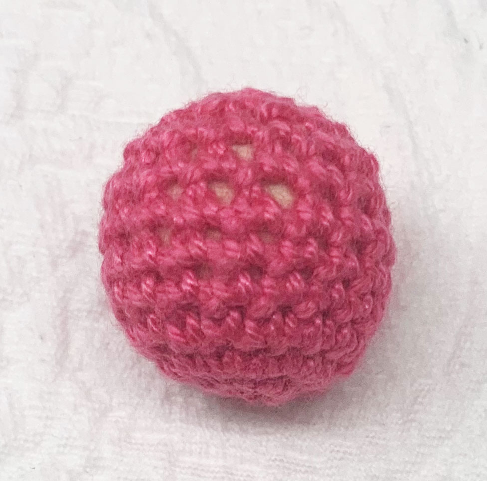 Häkelperle dunkelpink 
