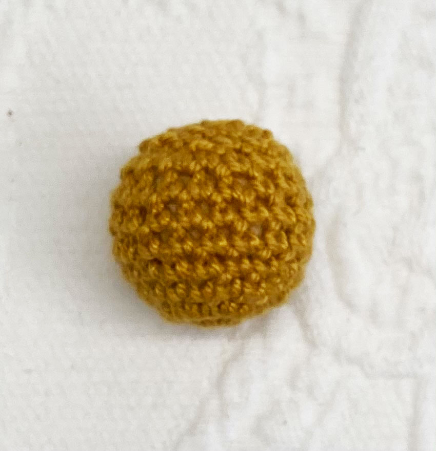 Häkelperle gold 