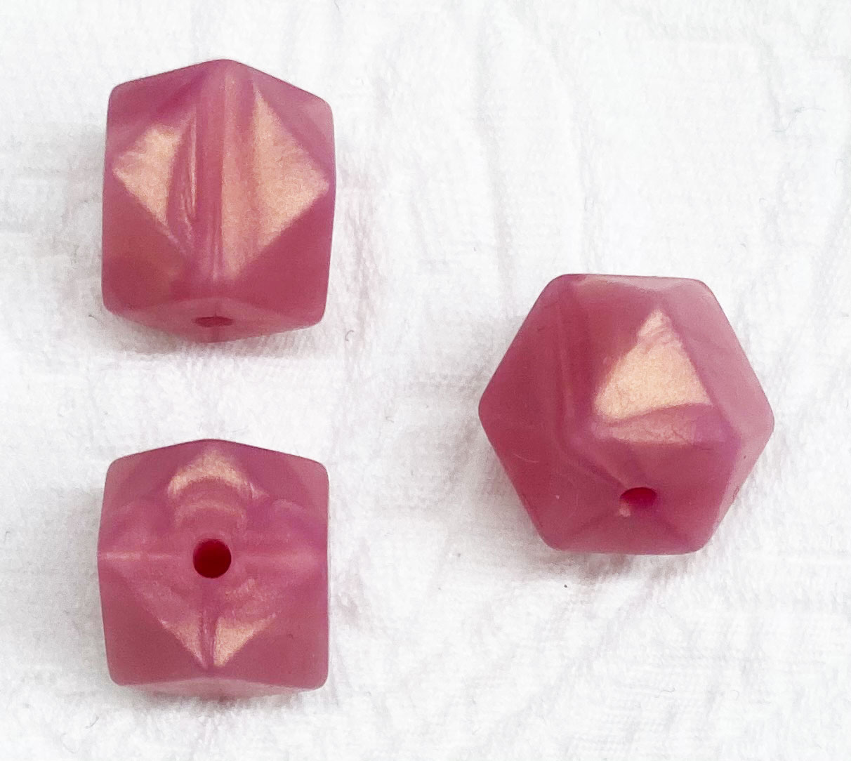Beissmotiv Diamant Hexagon roségold metallic 