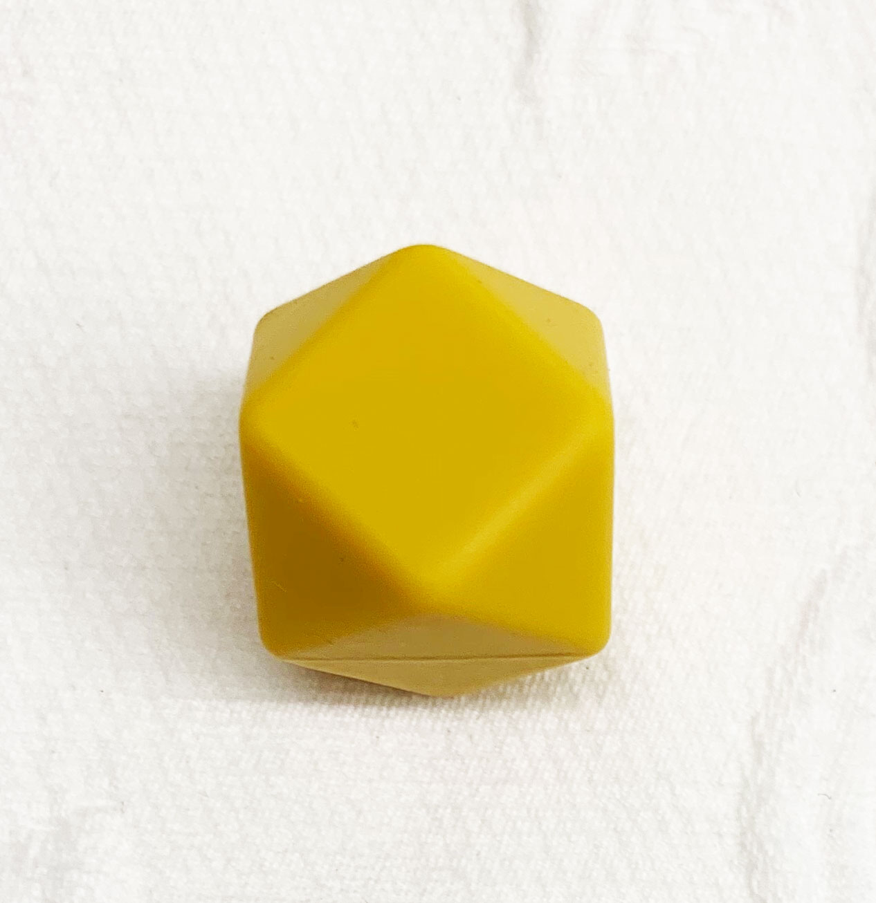 Beissmotiv Diamant Hexagon senfgelb 