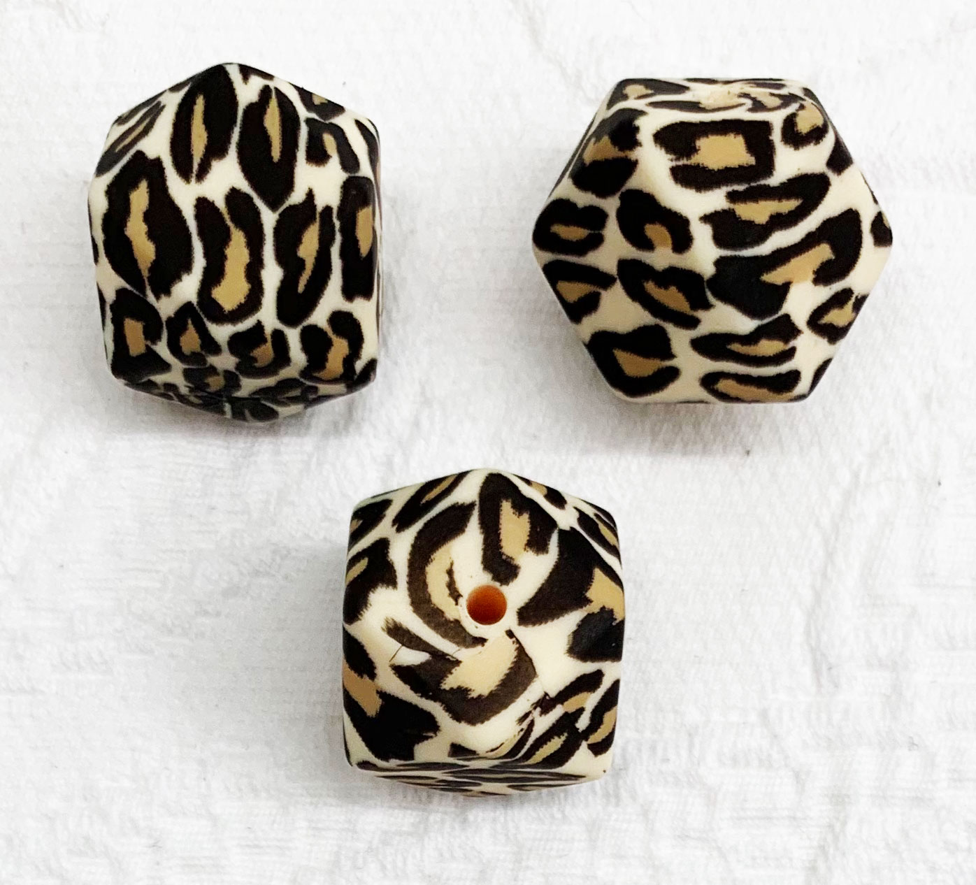 Beissmotiv Diamant Hexagon Leo natur   
