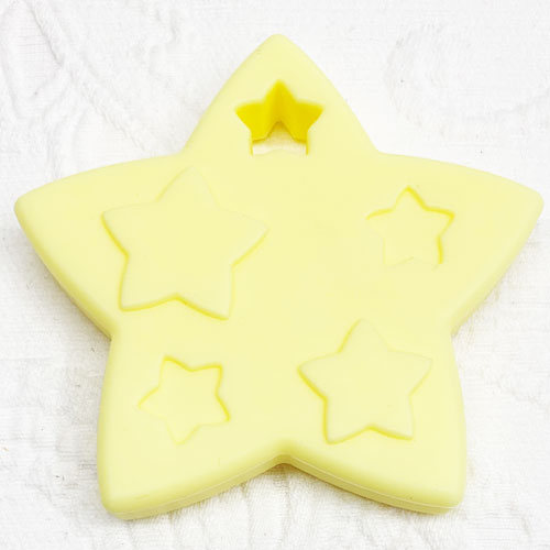 Beissanhänger Stern *Stella* pastellgelb   