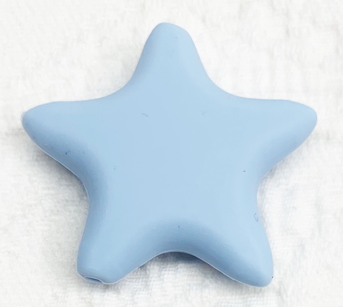Beissmotiv Sterne pastellblau 